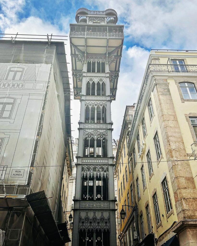 Iconic Santa Justa Lift in Lisbon, Portugal, showcasing its intricate iron architecture and historic design. A popular tourist attraction offering panoramic city views, currently temporarily closed fo.