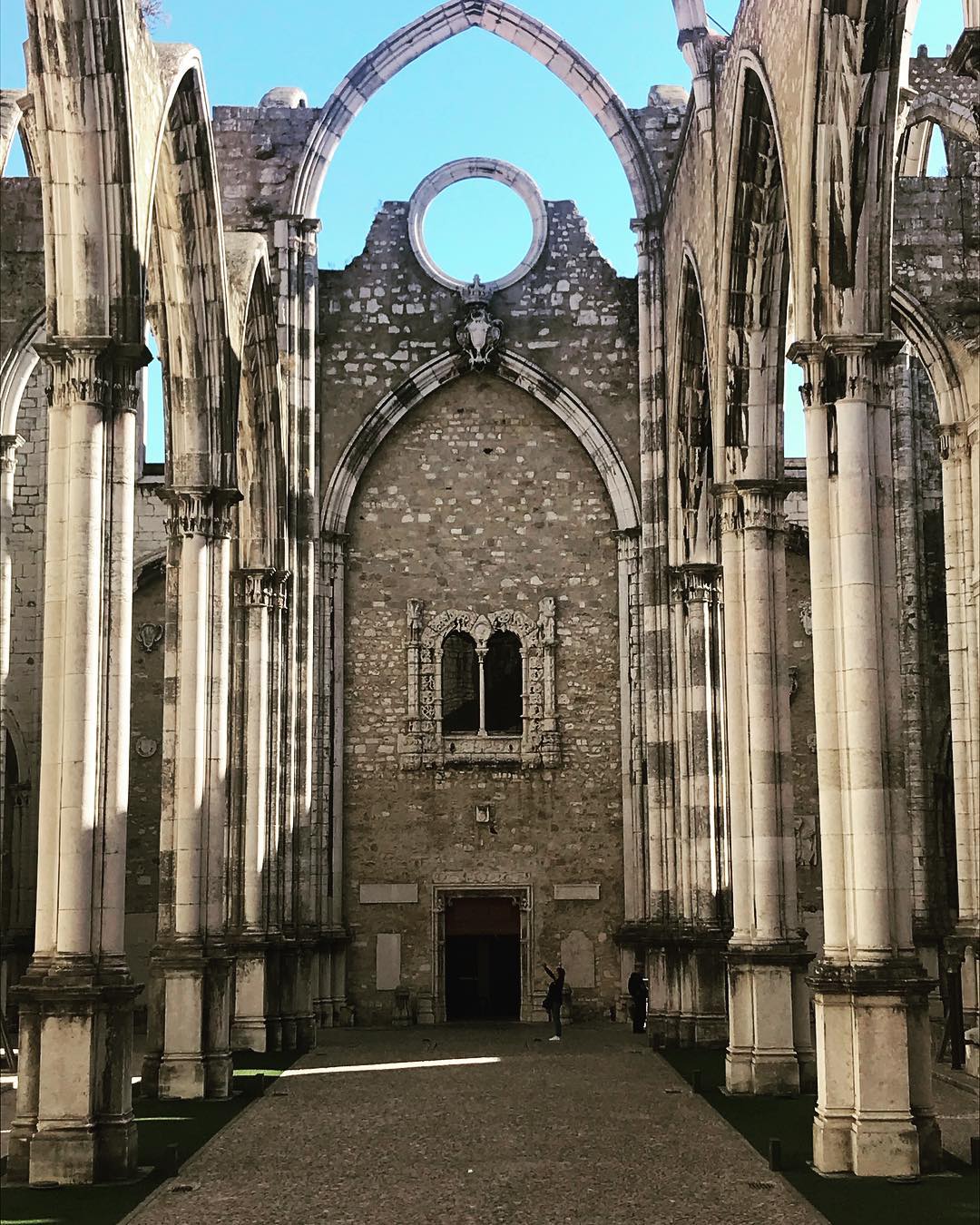 Ruins of Carmo Convent in Lisbon showcasing Gothic architecture and historic stone walls, part of the Carmo Convent Museum, a key cultural landmark in Lisbon’s historic center.