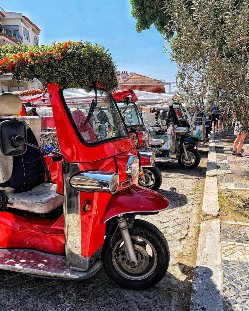 red tuk tuk in lisbon