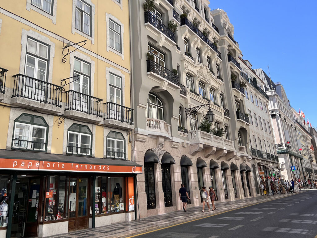 Beautiful Lisbon street with historic buildings and vibrant city atmosphere.
